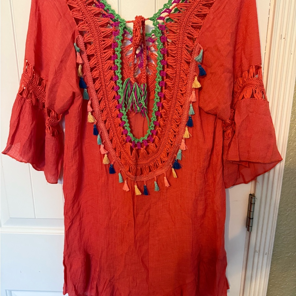 Vibrant Red Tunic with Colorful Tassels